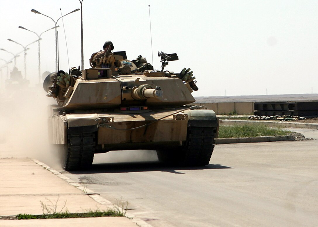 Haditha Dam, Al Anbar, Iraq - A tank with 4th Tank Co., 1st Tank battalion attached to 3/25 rollls in from a successful mission.