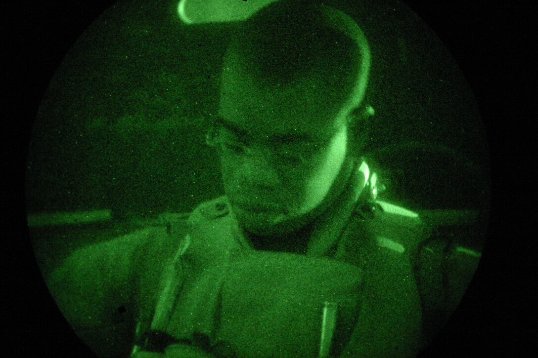 KARABILAH, Iraq- (June 17, 2005)  Lance Cpl. Andrew Morrison, 22, a rifleman with 3rd Platoon, Company K, 3rd Battalion, 2nd Marine Regiment, Regimental Combat Team-2 from Palm Beach, Fla.,  awaits arrival to Karabilah.  Operation Spear is conducted to destroy insurgency leadership strong points.  Before the operation was over Morrison had a confirmed kill of an insurgent in a suicide vehicle-borne improvised explosive device. (Official USMC photo by Cpl Neill A. Sevelius)(RELEASED)