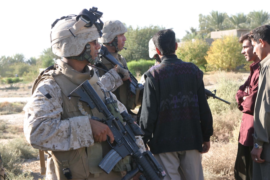 CAMP BLUE DIAMOND, RAMADI, Iraq -  Sergeant Mohamed S. Salim a platoon sergeant with Company L, 3rd Battalion, 10th Marine Regiment provides security for fellow Marines during a routine patrol. Salim and the Marines from his platoon have conducts nearly 100 patrols through the streets of Ar Ramadi that surround the camp here. Official U.S. Marine Corps photo by Sgt. Ryan S. Scranton