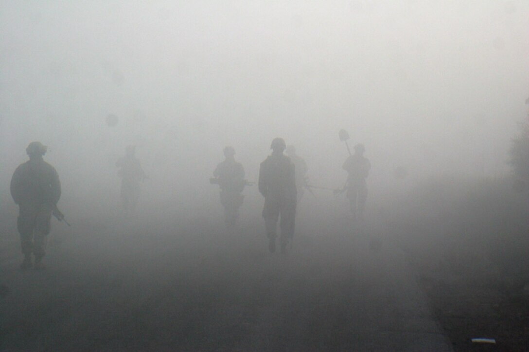 051118-M-2607O-001 - Marines from Company F along with engineers patrol through the thick fog in the early morning of Nov. 18 during Operation TRIFECTA.