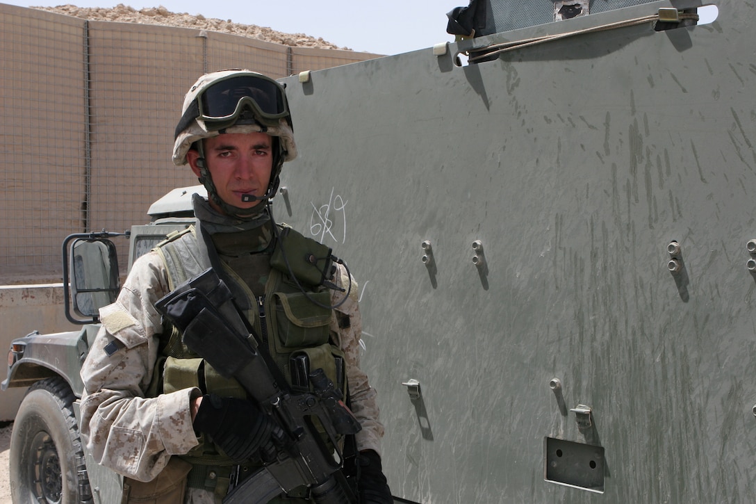 Sergeant Daniel C. Duff, radio operator, Team 3, Detachment 2, 5th Civil Affairs Group, 2nd Marine Division, troubleshoots communication issues and ensures the safety of his fellow Marines by providing security during missions aimed to make Iraq a better place for its citizens. The Osbourn Park High School graduate has been on a total of four deployments since joining the Corps, and is currently serving his second tour in Iraq.