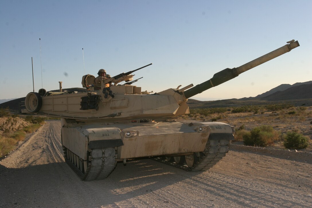 An M1A1 main battle tank prepares for demolition through Table 5, an assault course at Combat Center Range 500.  The Abrams is armed with an M256 120 mm smooth bore cannon as the main gun, an M2 .50 caliber machine gun and two M240G 7.62 caliber machine guns ? the loader?s weapon and one located co-axial with the main gun. Third Platoon, along with the battalion master gunner and the company commander, Delta Company, 1st Tank Battalion, executed their scheduled gunnery qualification at Range 500 Aug. 16 to 20.