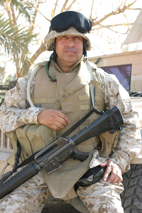 CAMP BLUE DIAMOND, AR RAMADI, Iraq --Gunnery Sgt. Joe Singh Rodriguez, the division's anti-terrorism force protection chief is a Marine with a wealth of experience very few others can compete with.  The Brawley, Calif. native is a veteran of more than 30 years in the nation's smallest service and an owner of a milti-million dollar security corporation.  U.S. Marine Corps photo by Sgt. Stephen D'Alessio (RELEASED)