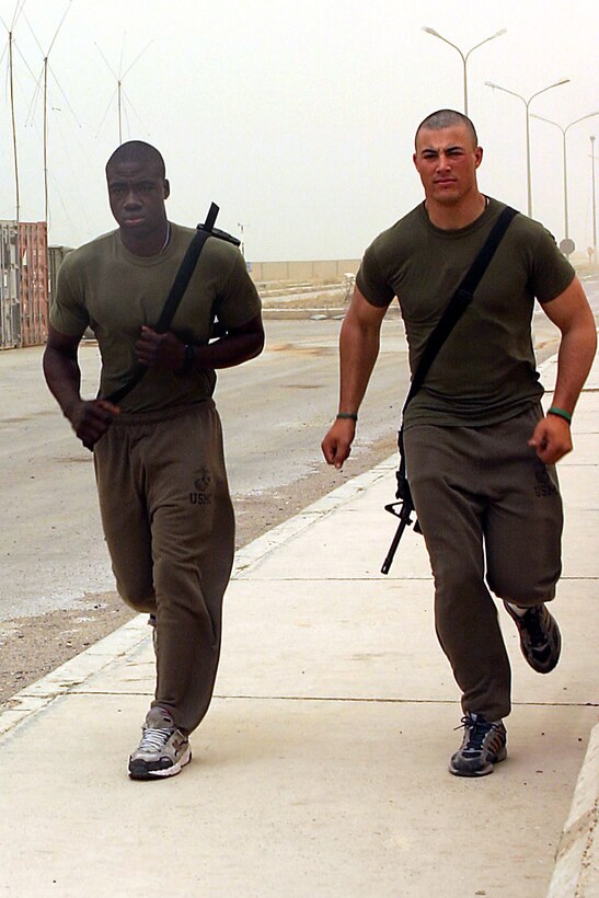 Haditha Dam, Al Anbar, Iraq (April 24, 2005)-- Lance Cpl.Nenyl K. Nyen, 19 of Columbus, Ohio and 19-year-old Lance Cpl. Jeffery E. Montee, a Dublin, Ohio native both infantrymen with 3/25 have been stationed together their entire Marine Corps career.(Official USMC Photo by Corporal Ken Melton)