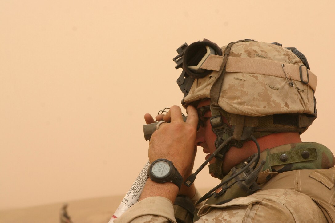 CAMP HADITHAH, Iraq -- Marines with Company L, 3rd Battalion, 25th Marine Regiment search for roadside bombs and mortar positions, April 19.  The search was prompted by a recent mortar attack that hit the dam.  Two Iraqis were found with a rifle, explosives and bomb making material.  U.S. Marine Corps photo by Sgt. Stephen D'Alessio (RELEASED)
