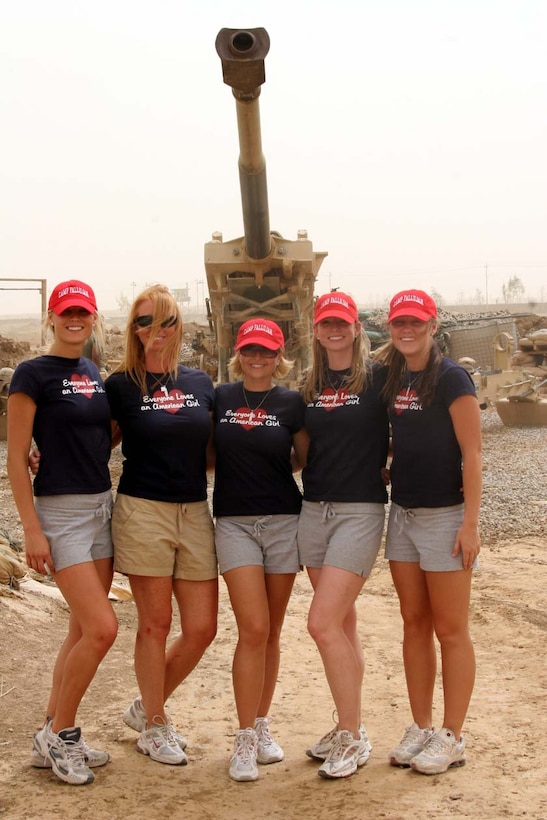 CAMP FALLUJAH, Iraq -- The Arizona Cardinals Cheerleaders visited the Marines and Sailors at Camp Fallujah, taking time to visit with the Marines with 1st Battalion, 10th Marine Regiment, an artillery unit working here.  Official U.S. Marine Corps photo by Lance Cpl. Athanasios L. Genos