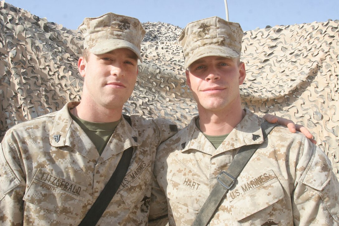 CAMP AL QA'IM, Iraq (September 1, 2005)- Cpl. Ryan S. Fitzgerald, 21, and Cpl. Nathan G. Hart, 21, both field radio operators with 3rd Battalion, 2nd Marine Regiment, Regimental Combat Team-2 and Windlake, Wis., natives made their first deployment to Iraq together and were engaged in a firefight together back in April. Fitzgerald graduated from Muskego High School in 2002 and Hart graduated a year after he did. The two Marines have gone through their first two years in the Marine Corps together from boot camp until now. (Official U.S. Marine Corps photo by Lance Cpl. Lucian Friel (RELEASED)