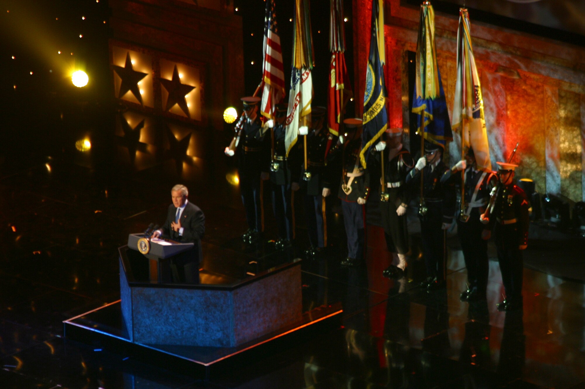 WASHINGTON -- President George W. Bush speaks to more than 7,500 servicemembers during a "Saluting Those Who Serve" celebration here Jan. 18.  The gala was designed to honor the armed forces and was the first event in a week of inaugural celebrations.  It included performances by military bands and honor guards and numerous celebrities.  (U.S. Navy photo by Petty Officer 1st Class F.T. Eyre)