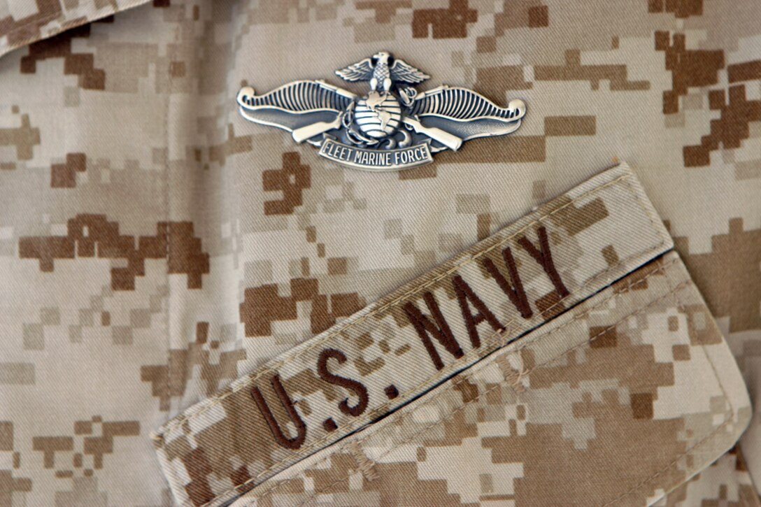 CAMP FALLUJAH, IRAQ – Hospitalman Joseph Gendron, a corpsman with 3rd Battalion, 8th Marine Regiment, was the most junior corpsman who earned his Fleet Marine Force pin in 2d Marine Division.  He is currently working with Truck Company as a corpsman with the Field Train.  Official U.S. Marine Corps photo by Lance Cpl. Athanasios L. Genos