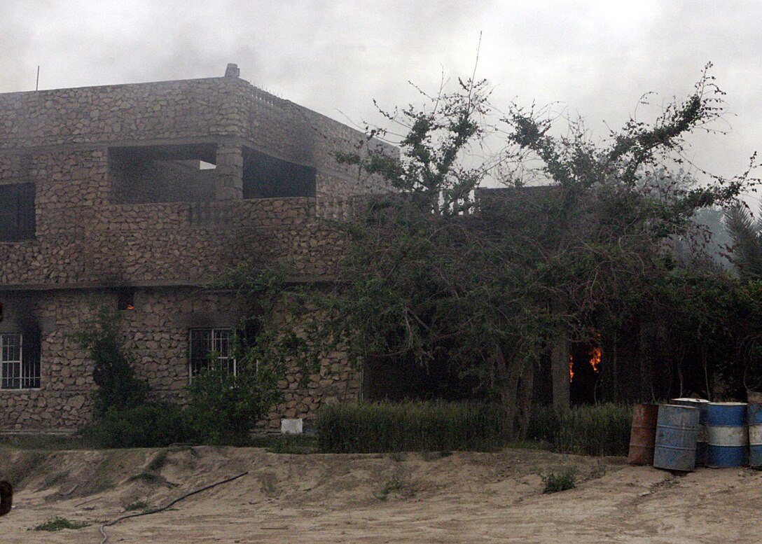 Haqlaniya, Al Anbar, Iraq (April 20, 2005)-- A house that held insurgents attacking Marines was hit with a TOW missle .(Official USMC Photo by Corporal Ken Melton)