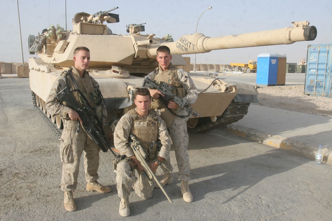 CAMP AL QA'IM, Iraq (August 21, 2005)- Lance Cpl. Benjamin Hallstrom, 22, Cpl. Matt Orth, 22, and Sgt. Chris Whitman, 23, Marines with 3rd Battalion, 2nd Marine Regiment deployed to Iraq are all natives of Clearwater, Fla., and graduates of Clearwater High School. Hallstrom is an team leader with Company K, Orth is a scout sniper with the battalion's sniper platoon and Whitman is a mortar team leader with Company L. The three Marines all have deployed at least twice during the Global War on Terrorism and have been in the same unit since early 2004. (Official U.S. Marine Corps photo by Lance Cpl. Lucian Friel (RELEASED)