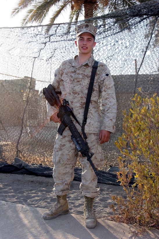 AR RAMADI, Iraq (September 30, 2005) - Private First Class David Shellito Jr., a machine gunner with 2nd Platoon, Company L, 3rd Battalion, 7th Marine Regiment, joined the Corps for college money, but realizes that experiences like deploying to Iraq are once in a lifetime. Photo by Cpl. Shane Suzuki