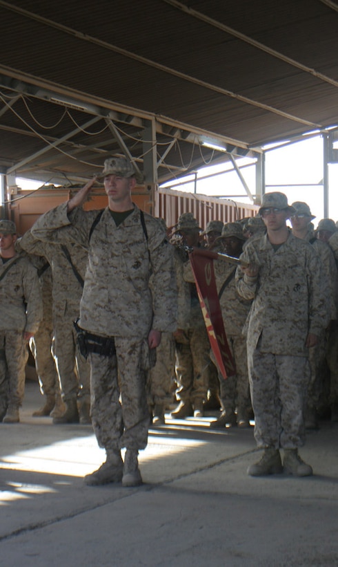 051020-M-2607O-011 - Captain Joel F. Schmidt and Marines from the company salute their fallen comrades for their sacrifice on during the memorial service Oct. 20 aboard Camp Fallujah.