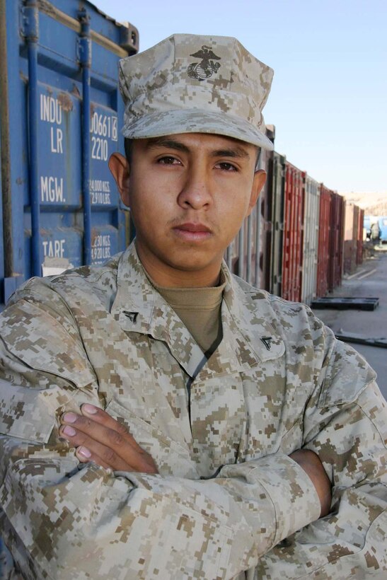 CAMP RIPPER, Iraq (Nov. 15, 2005) - Bakersfield, Calif. native Lance Cpl. Larry O. Martinez, an embarkation and logistics clerk for Regimental Combat Team-2, supports more than 5,000 troops everyday with essential gear to continue the Global War on Terrorism. Supporting the recent Operation Steel Curtain has kept the 2003 West High School graduate busy keeping Marines equipped while they clear the city of insurgents. (Official Marine Corps photo by Cpl. Adam C. Schnell)