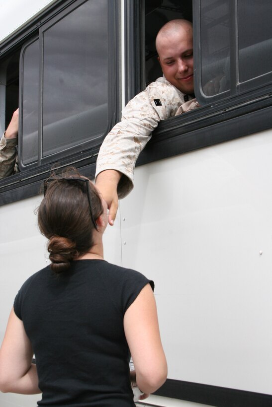 Seaman R.J. Nelson says one more goodbye to his wife Melita. Nelson is a hospital corpsman deploying to Iraq with 1st Tank Battalion, Bravo Co. on Sept. 20.  Melita will be going home to her family during Bravo Co.?s seven- to nine-month deployment.