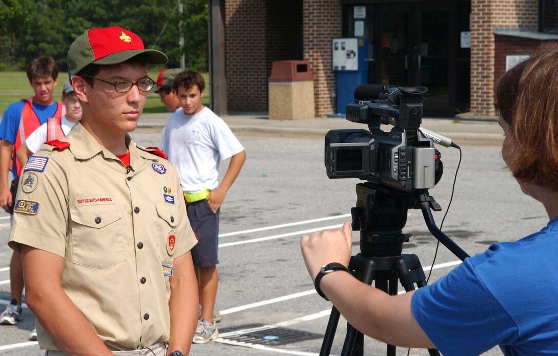 Daniel Griffith gives an interview to LCTV-10 reporter Lance Cpl. Amber Blanchard, a combat correspondent with the Public Affairs Office, Marine Corps Base, during his environmental awareness project Aug. 20.