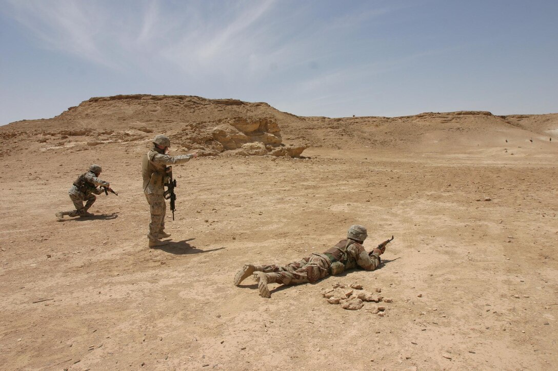 Camp Ripper,Al Asad, Iraq (May 21, 2005) - Sgt. Andrew J. Wittmer, 25, of Peoria, Illi., an instructor during this training phase watches soldiers of the reconnaissance company of the 7th Iraqi Security Battalion perform a drill.  (Official USMC photo by Cpl. Ken Melton)