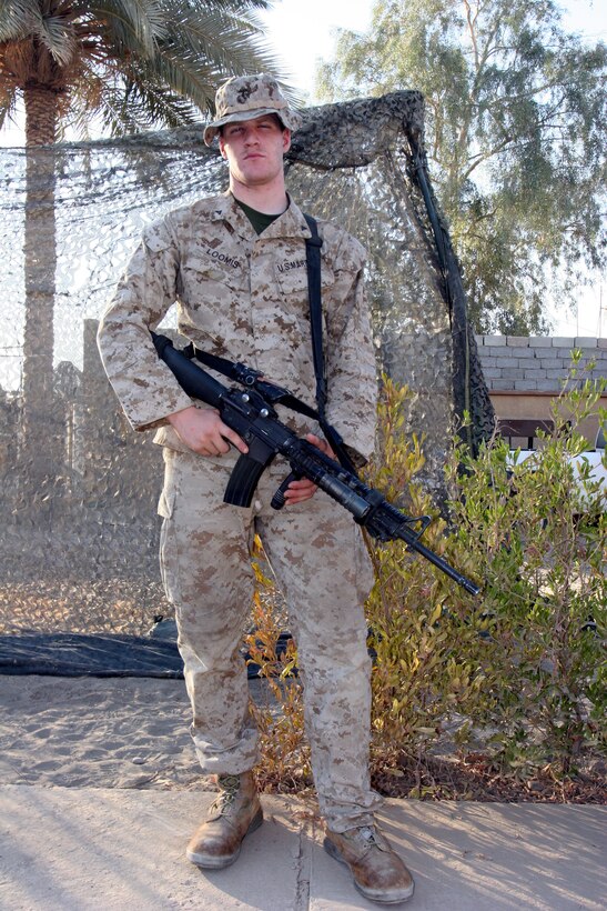 AR RAMADI, Iraq (September 30, 2005) - Lance Cpl. James Loomis, a heavy machine gunner with 2nd Platoon, Company L, 3rd Battalion, 7th Marine Regiment, joined the Marine Corps after high school for experiences that serving as a infantryman in the Marine Corps cold provide. Photo by Cpl. Shane Suzuki