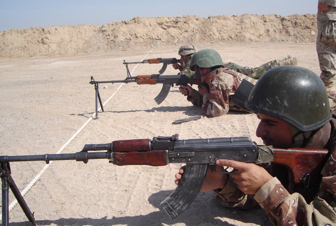 04- CAMP HABBANIYAH, Iraq - Iraqi Soldiers aim in thier RPK light machine guns during the Iraqi Small Arms Weapons Instructor Course taught by the Marines of the 2nd Marine Division Training Center here.