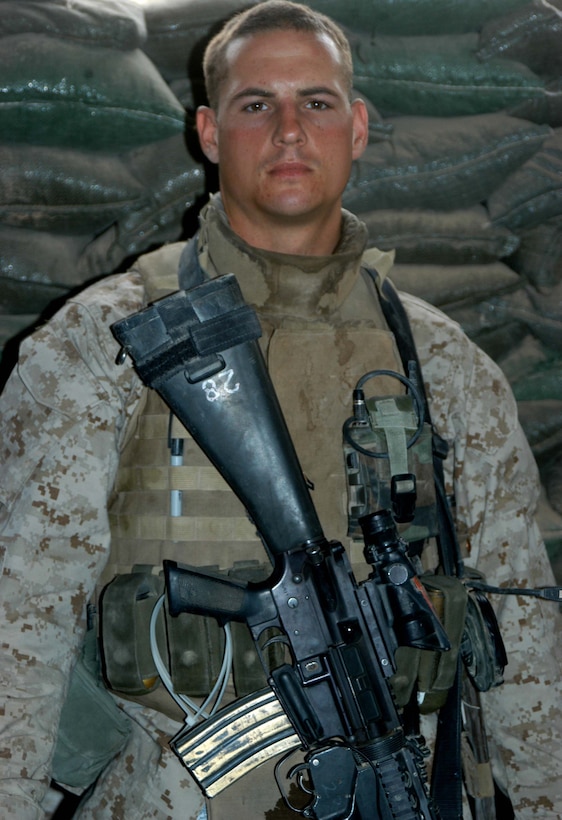 AR RAMADI Iraq (June 2, 2005) - Corporal Donald W. Ball, a team leader and machine gunner with 3rd Squad, 4th Platoon, Company B, 1st Battalion, 5th Marine Regiment, conducted his final combat mission in the city here June 20. The 22-year-old from Salt Lake City is a three-time veteran of Operation Iraqi Freedom. He leaves Iraq in July and the Marines with an honorable discharge in September. He plans on attending the University of Utah in pursuit of a Bachelor's of Arts degree. Photo by: Cpl. Tom Sloan