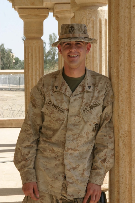 CAMP BLUE DIAMOND, RAMADI, Iraq - Lance Cpl. Jason M. Crawford, a tactical data network specialist, with Headquarters Battalion, 2nd Marine Division is helping keep Marines in the region safe from both the insurgency and each other with the aid of the Blue Force Tracker. The global positioning system allows Crawford to monitor all administrative and logistical convoys traveling through the Al Anbar province. He uses the information he gathers from the tracking system to coordinate medical aid to Marines attacked by insurgents and to inform other Marines manning checkpoints and guard posts of the convoy's arrival in their area reducing the chance of mistaken identity. Official U.S. Marine Corps photo by Sgt. Ryan S. Scranton