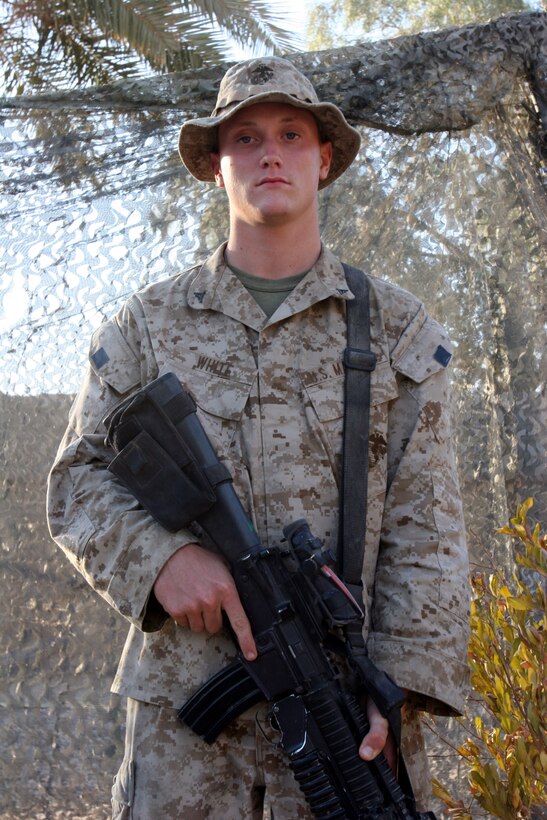 AR RAMADI, Iraq (October 8, 2005) - Lance Cpl. Troy White, a rifleman with Company L, 3rd Battalion, 7th Marine Regiment, is excited to be Iraq and is looking forward to helping the Iraqi people experience freedom for the first time. "Coming here is what I wanted to do and I am excited and ready to do it." Photo by Cpl. Shane Suzuki