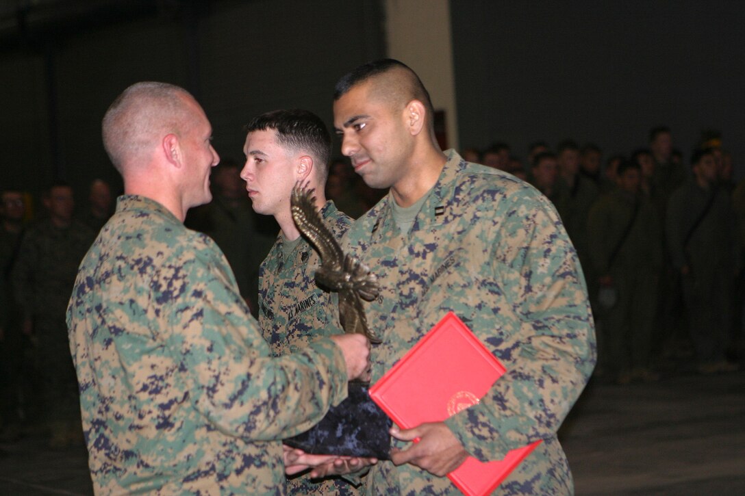 MARINE CORPS BASE CAMP LEJEUNE, N.C. (December 14, 2005) - Captain John L. Medeiros, Jr. and Sgt. Nathan W. Owens of 2nd Assault Amphibious Battalion, 2nd Marine Division were awarded the Navy Marine Corps Association Leadership Award Dec. 12.  Medeiros was also awarded the Navy and Marine Corps Commendation for his actions while deployed to Iraq.