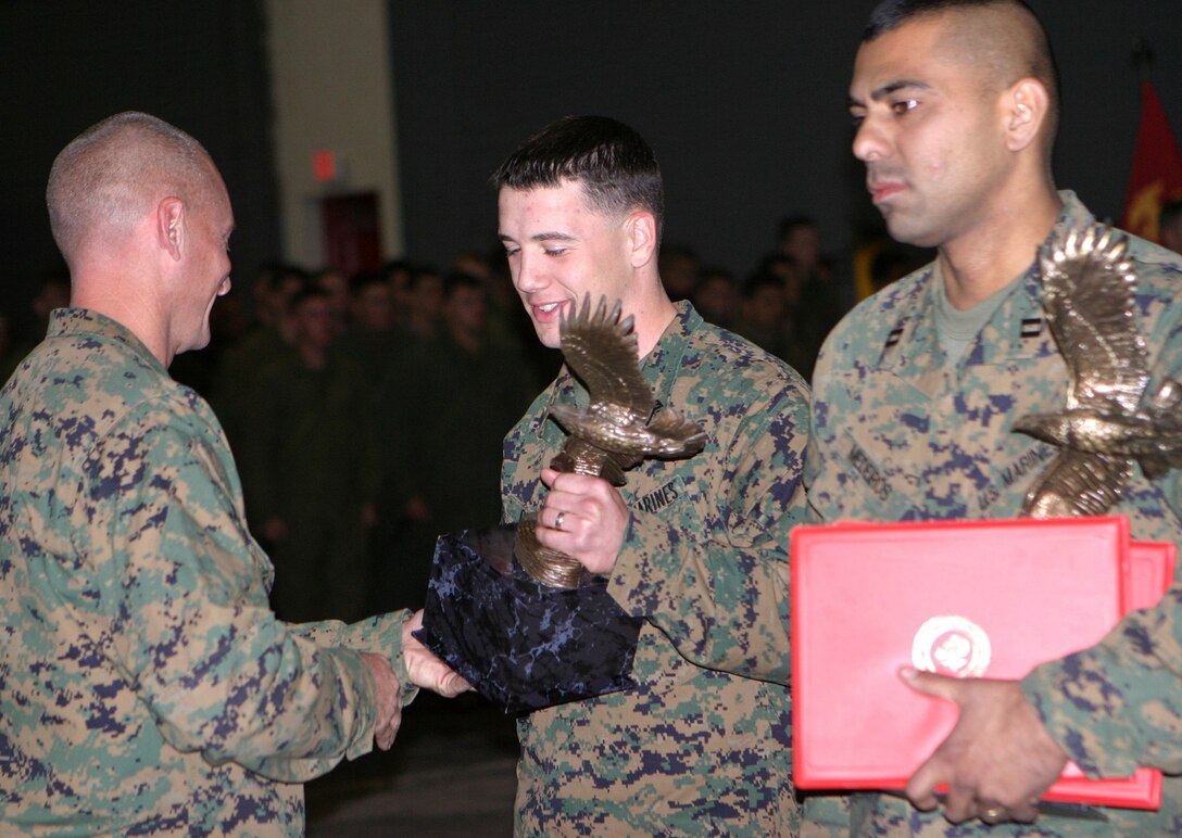 MARINE CORPS BASE CAMP LEJEUNE, N.C. (December 14, 2005) - Captain John L. Medeiros, Jr. and Sgt. Nathan W. Owens of 2nd Assault Amphibious Battalion, 2nd Marine Division were awarded the Navy Marine Corps Association Leadership Award Dec. 12.  Medeiros was also awarded the Navy and Marine Corps Commendation for his actions while deployed to Iraq.
