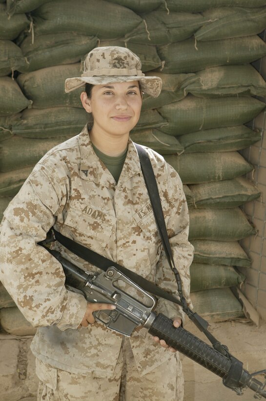 Lance Cpl. Estrella R. Adams, 21, multi-channel radio operator, Wire Shop, S-6, Regimental Combat Team 8, 2nd Marine Division, and a native of McAllen, Texas, has been in Iraq since March and has spent more than three months on the Female Search Team.