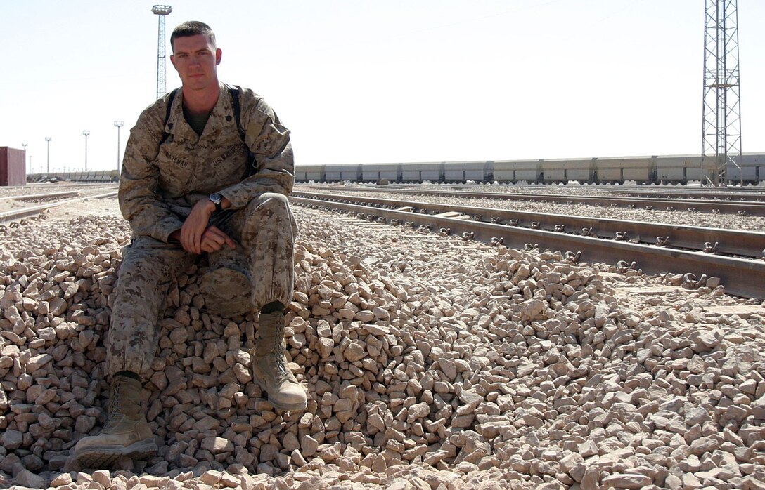 CAMP AL QA'IM, Iraq (Sept. 4, 2005) -- Orlando, Fla., native Sgt. David S. Bateman, assistant radio chief, communications platoon, Headquarters & Service Company, 3rd Battalion, 6th Marine Regiment, 2nd Marine Division recently reenlisted after nearly a four year break in service to attend college and work as a golf professional.  Bateman came back in to the Marine Corps for the benefits for himself and his family.  (Official U.S. Marine Corps photo by Sgt. Jerad W. Alexander)