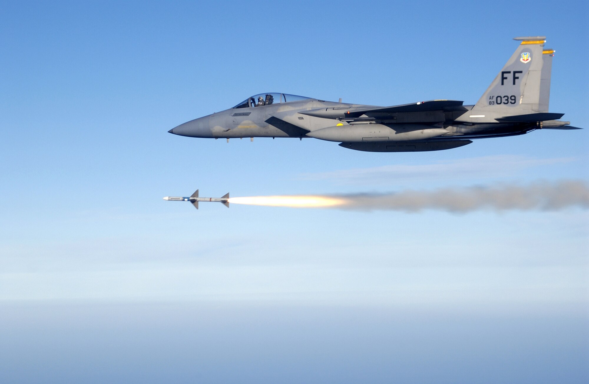 OVER THE GULF OF MEXICO -- First Lt. Charles Schuck fires an AIM-7 Sparrow medium range air-to-air missile from an F-15 Eagle here while supporting a Combat Archer air-to-air weapons system evaluation program mission.  He and other Airmen of the 71st Fighter Squadron deployed from Langley Air Force Base, Va., to Tyndall AFB, Fla., to support the program.  (U.S. Air Force photo by Master Sgt. Michael Ammons) 