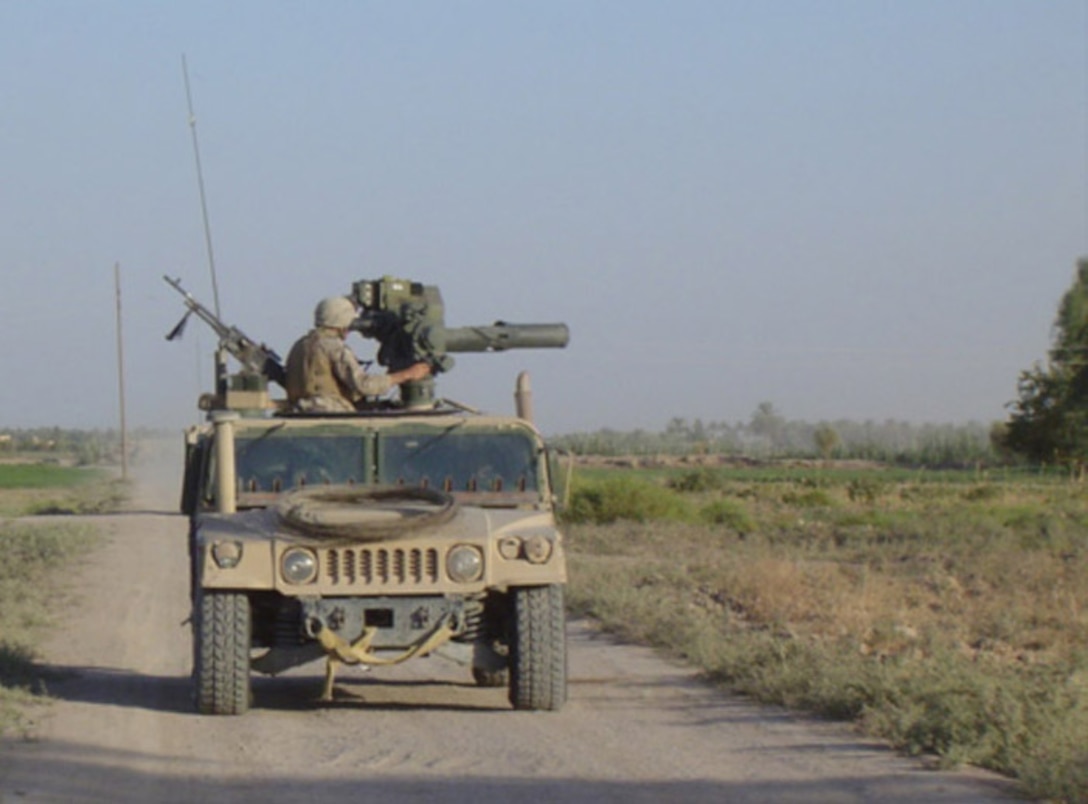 Sams 2 -- Marines from Weapons Company, 2d Battalion, 2d Marine Regiment, use the new tube-launched, optically-tracked, wire-guided missile sighting system while on patrol in their Area of Operation.