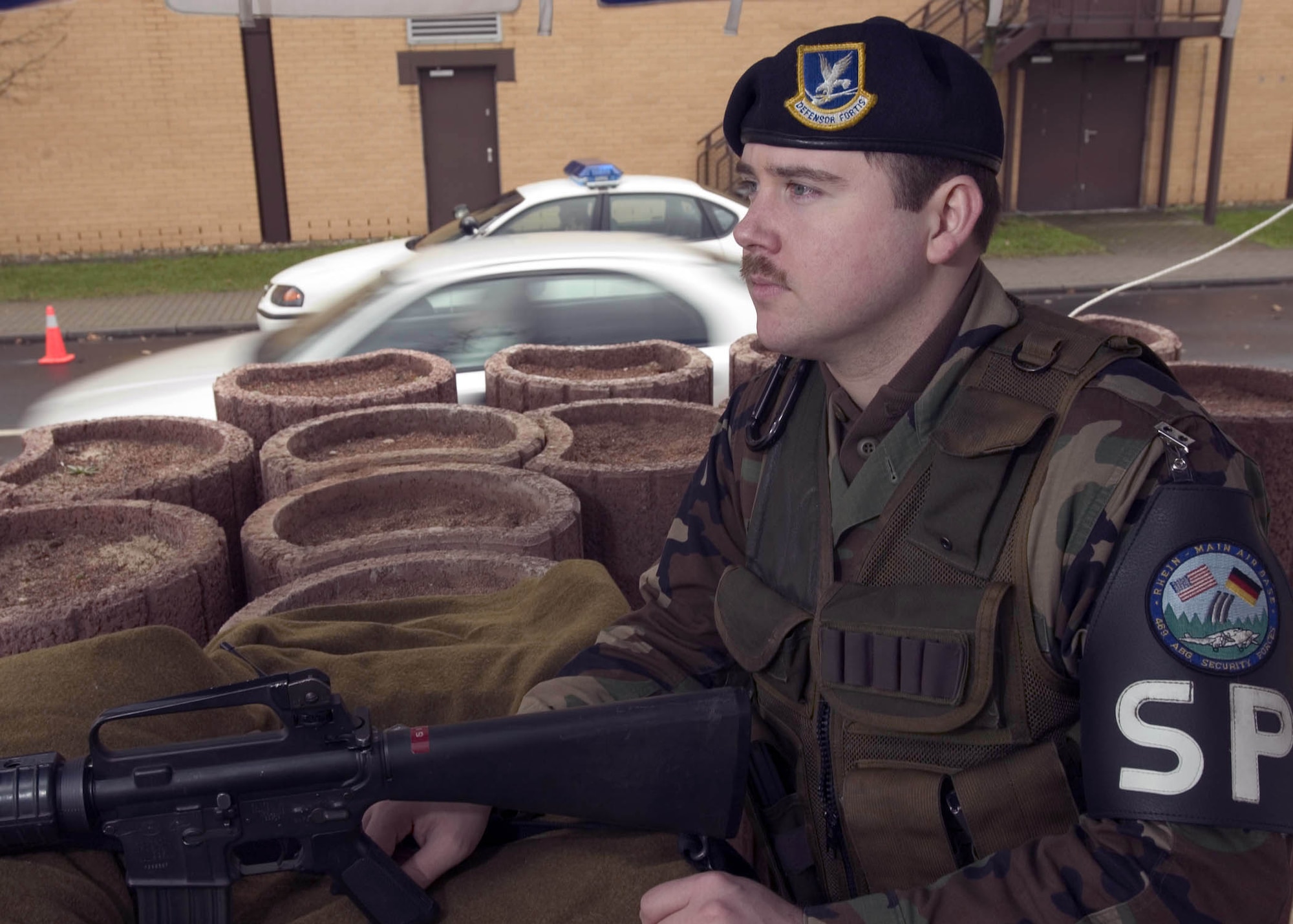 RHEIN-MAIN AIR BASE, Germany -- Staff Sgt. Jeffrey Clairmont provides security here.  He and other security forces augmentees are helping the 469th Air Base Group's security forces flight while Operations Enduring and Iraqi Freedom missions are flying from here.  The base is scheduled to be officially returned to Germany on Dec. 31.  Sergeant Clairmont is from the 435th Security Forces Squadron at nearby Ramstein Air Base.  (U.S. Air Force photo by Master Sgt. John E. Lasky)