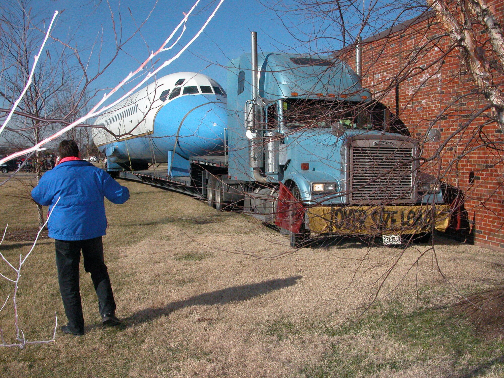 SCOTT AIR FORCE BASE, Ill. -- A tractor-trailer carried a DC-9 fuselage here from across the southwestern United States.  The fuselage was then lifted into an Air Force Communications Agency compound.  (U.S. Air Force photo by Janet Moreiko-Gagen)