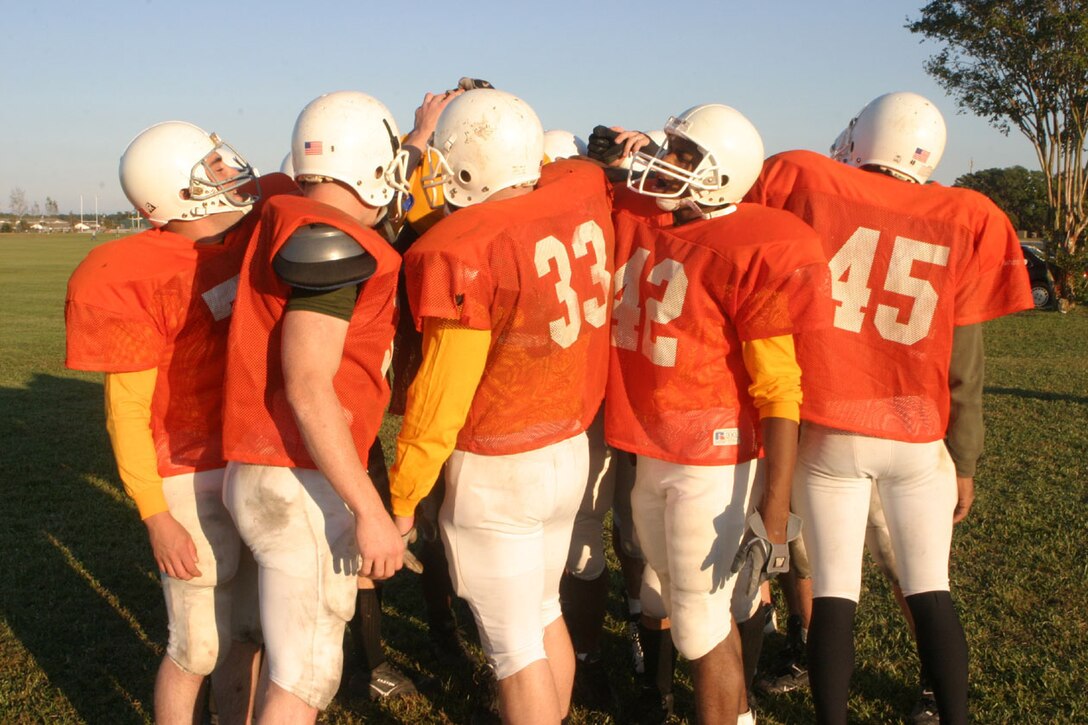 MARINE CORPS BASE CAMP LEJEUNE, N.C. (Oct. 27, 2005)- After their victory over the 4th Marine Expeditionary Intramural Football team, the players of the 2nd Marine Division Headquarters team get hyped-up before practice here today. (Official U.S. Marine Corps photo by Lance Cpl. Lucian Friel (RELEASED)