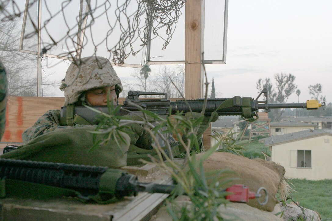 MARCH AFB MORENO VALLEY, Calif. (January 28, 2005)- Lance Cpl. Arthur L. Ware, a reservist truck driver with 3rd Battalion, 2d Marine Regiment aims in on a target during security and stabilization operations. The 2001 Greenwood High School graduate has been in the Marine Corps for four years.