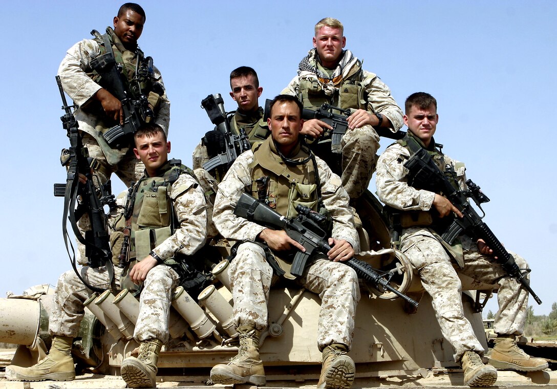 CAMP BAHARIA, Iraq – From left to right: Staff Sgt. Darian Patterson, Cpl. Tyler Allamong, Sgt. Daniel Duff, Maj. Chris Phelps, Sgt. Sean Lawlor, and Sgt. Matthew Dreher, comprise Team 3, Detachment 2, 5th Civil Affairs Group. Team 3 is group of mobilized reservists from the Baltimore area who operated out of the Northern Fallujah and Saqlawiyah areas during their seven-month tour of duty in Iraq.  The Marines worked beside 1st Battalion, 6th Marine Regiment infantrymen; Iraqi Security Forces, local contractors and government officials to continue the ongoing task of rebuilding the communities and restoring the nation's broken infrastructure.