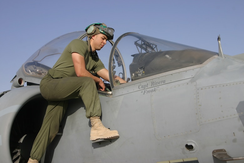 AL ASAD, Iraq ? Sergeant Douglas Acero an avionics technician with Marine Attack Squadron 311 checks some of the avionics systems in a ?Tomcat? AV-8B Harrier April 29. Acero, along with his fellow ?Tomcats? are scheduled to return to Marine Corps Air Station Yuma, Ariz., in May after a seven-month deployment in support of Operation Iraqi Freedom.