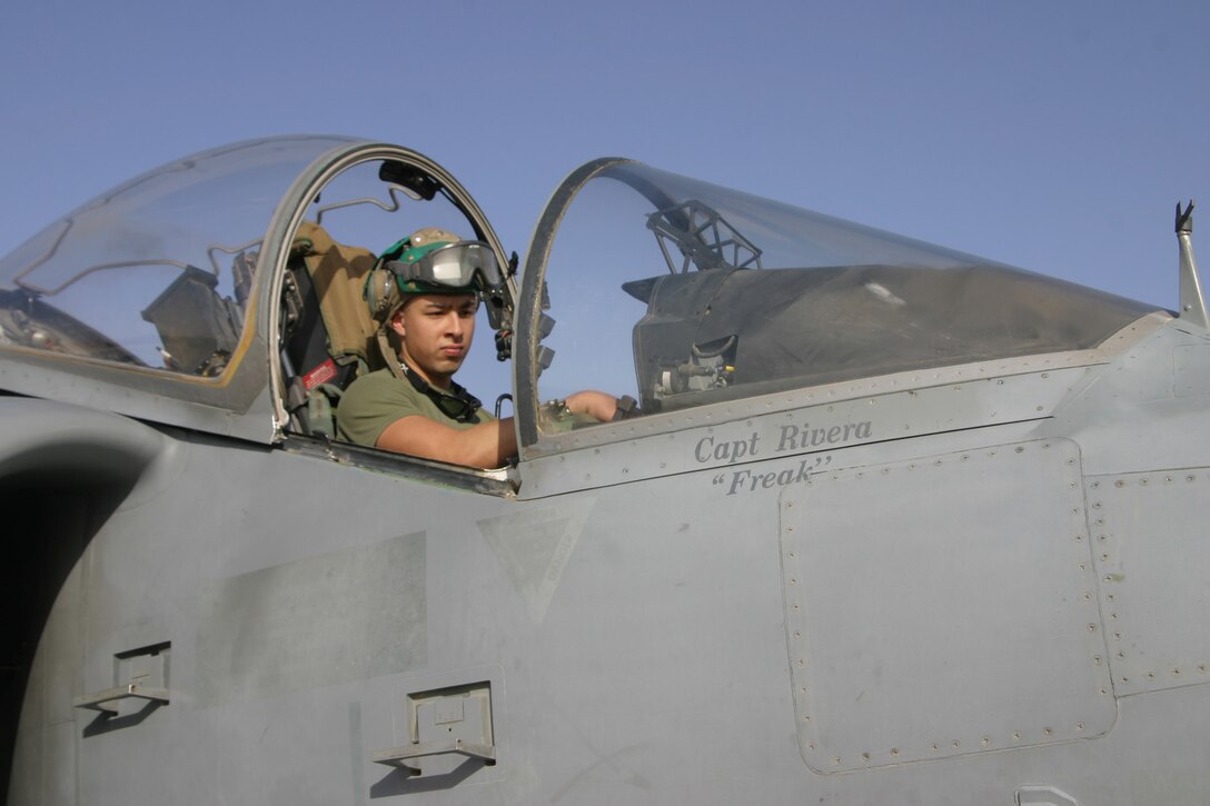 AL ASAD, Iraq ? Sergeant Douglas Acero an avionics technician with Marine Attack Squadron 311 checks some of the avionics systems in the cockpit of a ?Tomcat? AV-8B Harrier April 29. Acero, along with his fellow ?Tomcats? are scheduled to return to Marine Corps Air Station Yuma, Ariz., in May after a seven-month deployment in support of Operation Iraqi Freedom.