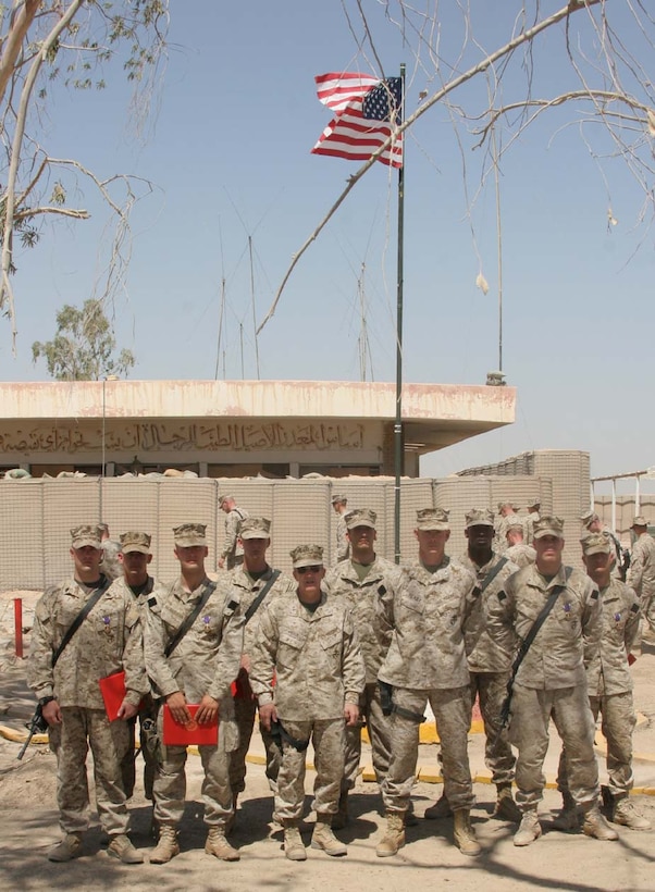 CAMP FALLUJAH, Iraq -- Major Gen. Richard A. Huck, 2nd Marine Division commanding general visited 3rd Battalion, 8th Marine Regiment to present them with their Purple Hearts.  Huck also spoke to them about the job they have been doing so far.