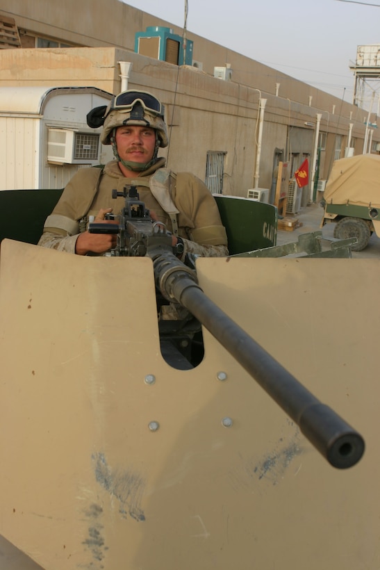CAMP AL QA'IM, Iraq (April 9, 2005)- Cpl. Robert L. Gass, a tow gunner with Weapons Company, 3rd Battalion, 2nd Marine Regiment, Regimental Combat Team-2 is a vehicle commander of a combined anti-armor team. The Moncks Corner, S.C., native is deployed to the Al Anbar province of western Iraq where he has experienced a new culture he never would have if he didn't join the Corps two and a half years ago. Official U.S. Marine Corps photo by Lance Cpl. Lucian Friel (RELEASED)