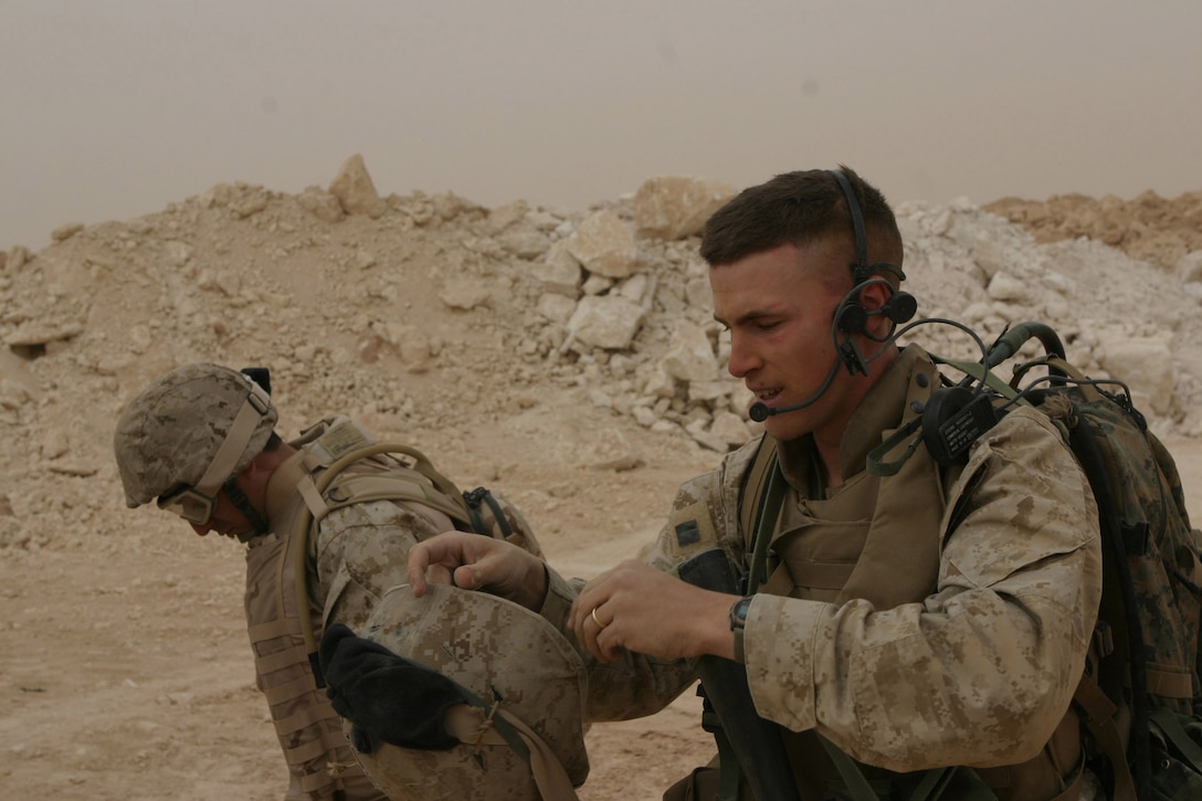 CAMP RIPPER, AL ASAD, Iraq -- Second Lieutenant Nick Wingate, a 25-year-old platoon commander with Beowulf and Madison, Va. native, leads his Marines in a cement factory search during a cordon and knock mission, April 15.  The 1999 Madison County High School graduate is a member of Beowulf, the regimental reserve force for Regimental Combat Team 2, responsible for a myriad of tasks from security and sustainment operations to setting up snap vehicle control points.  U.S. Marine Corps photo by Sgt. Stephen D'Alessio (RELEASED)