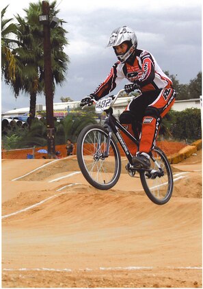 Sergeant Brian Randolph races in the NorCal versus SoCal California Cup in San Bernardino, Calif., where he took first place overall. Randolph just returned from a trip to Phoenix, Ariz., where he took first place in his age category both days of the American Bicycle Association Fall Nationals Oct. 28 to 30.