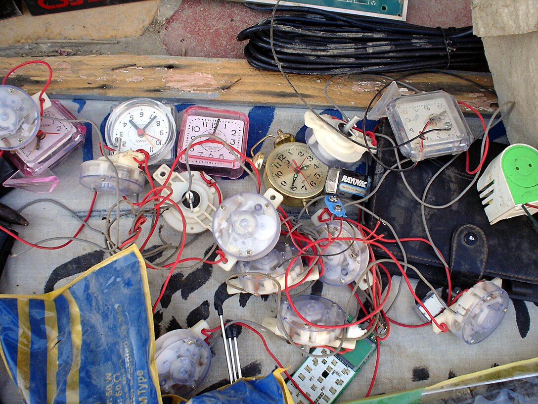 Hit, Iraq (August 31, 2005)-- Marines from Company "I", 3rd Battalion, 25th Marines uncovered boxes of ammunition, explosives, electronic equipment and propanganda during a cache find on a patrol. (Official USMC Photo courtesy of 3rd Battalion, 25th Marine Regiment)