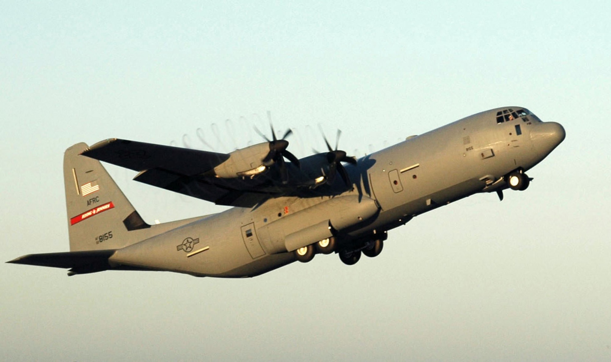 SAN ANTONIO -- A C-130J Hercules, like the one shown here, made a first-ever combat airdrop June 30.  The mission supported an Army air assistance request for troop re-supply and civic assistance to be dropped in the vicinity of Kandahar, Afghanistan.  (Air Force file photo)