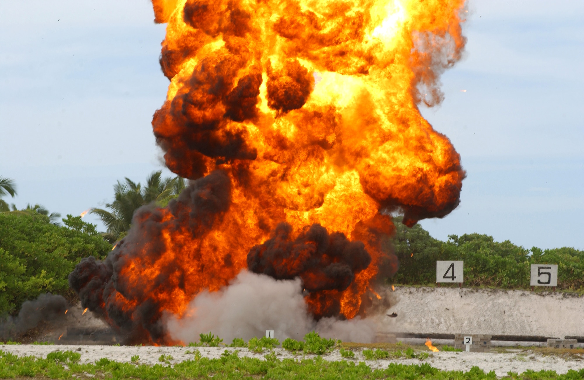 OPERATION ENDURING FREEDOM -- A van loaded with C-4 explodes as part of a firepower demonstration at a forward-deployed location.  Airmen with the 40th Expeditionary Civil Engineer Squadron's explosive ordnance disposal flight participated in the demonstration along with security forces Airmen and British royal marines.  (U.S. Air Force photo by Staff Sgt. Jocelyn Rich)