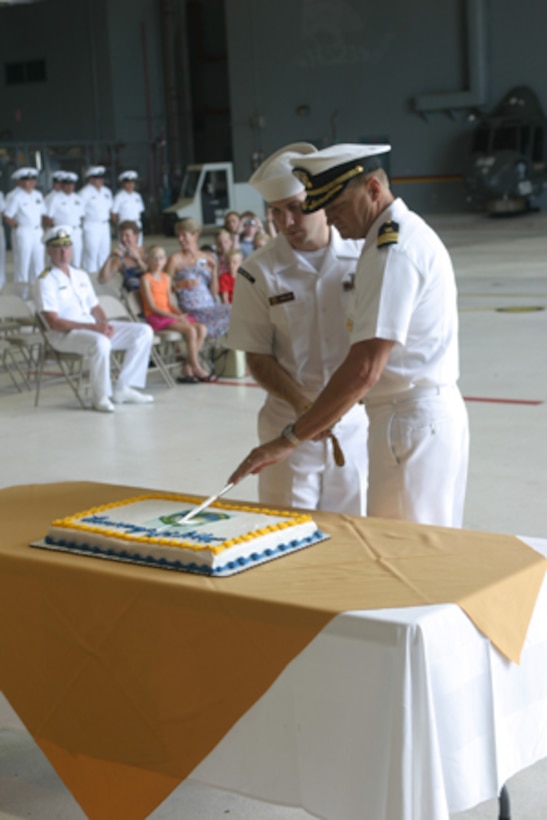 Commander Patrick Malenda,Commanding Officer of HSL-37, and AM2 Sam B. Phillips,HSL-37,cut the ceremonial cake as HSL-37 celebrates their units 30th anniversary, Tuesday.