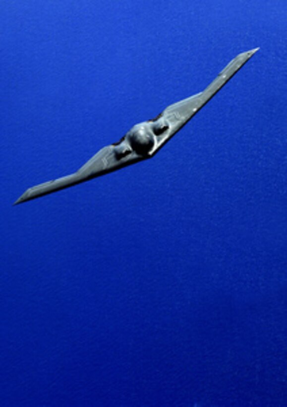 An Air Force B-2 Spirit bomber banks as it maneuvers into position for aerial refueling over the Pacific Ocean on June 29, 2005. The stealth bomber is deployed from the 393rd Expeditionary Bomb Squadron at Whiteman Air Force Base, Mo., to Andersen Air Force Base, Guam, to maintain a continuous presence in the Asia-Pacific region. 