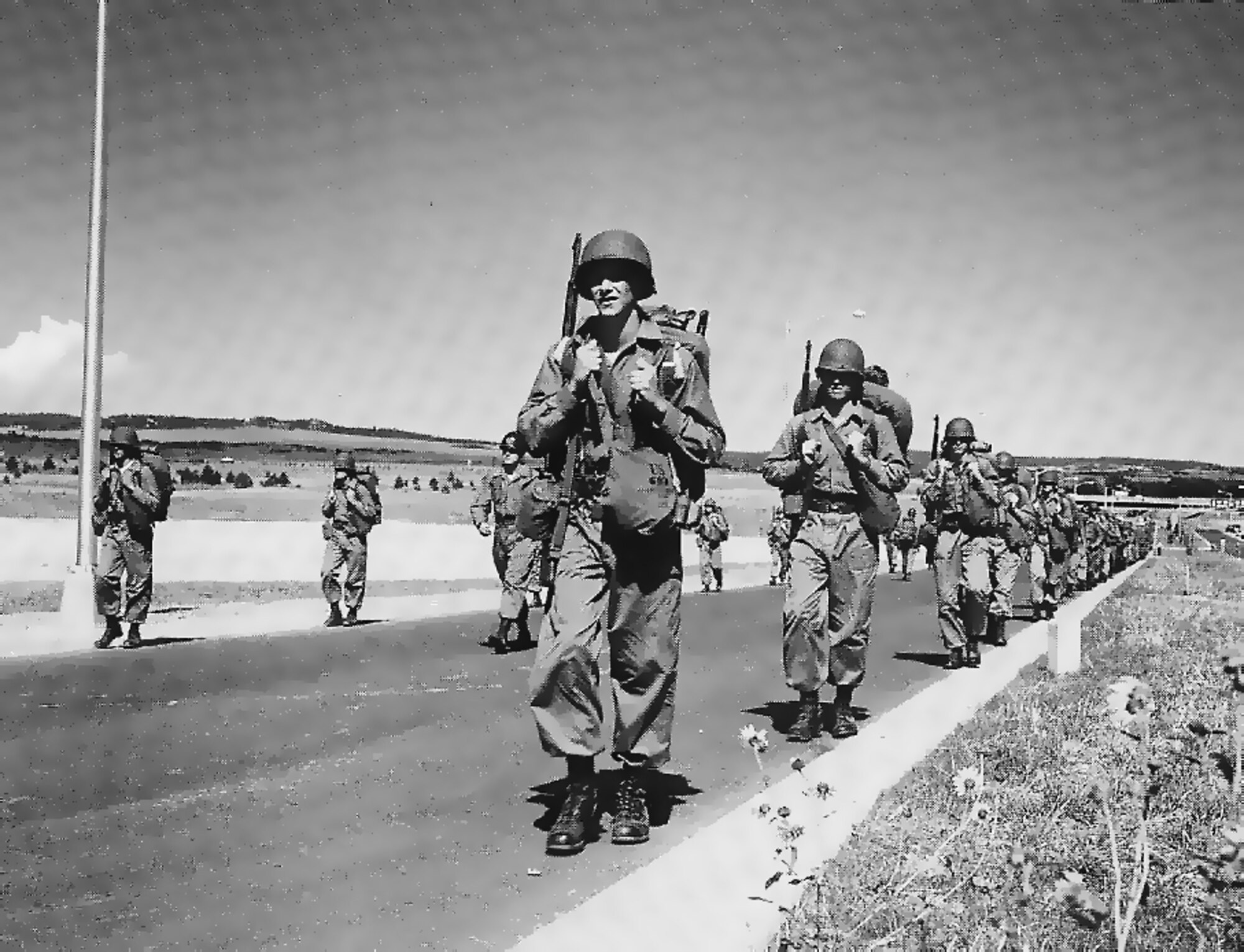 LOWRY AIR FORCE BASE, Colo. -- Cadets from the first Air Force Academy class march during a training exercise at the school's temporary location here during the summer of 1955.  (U.S. Air Force photo)

