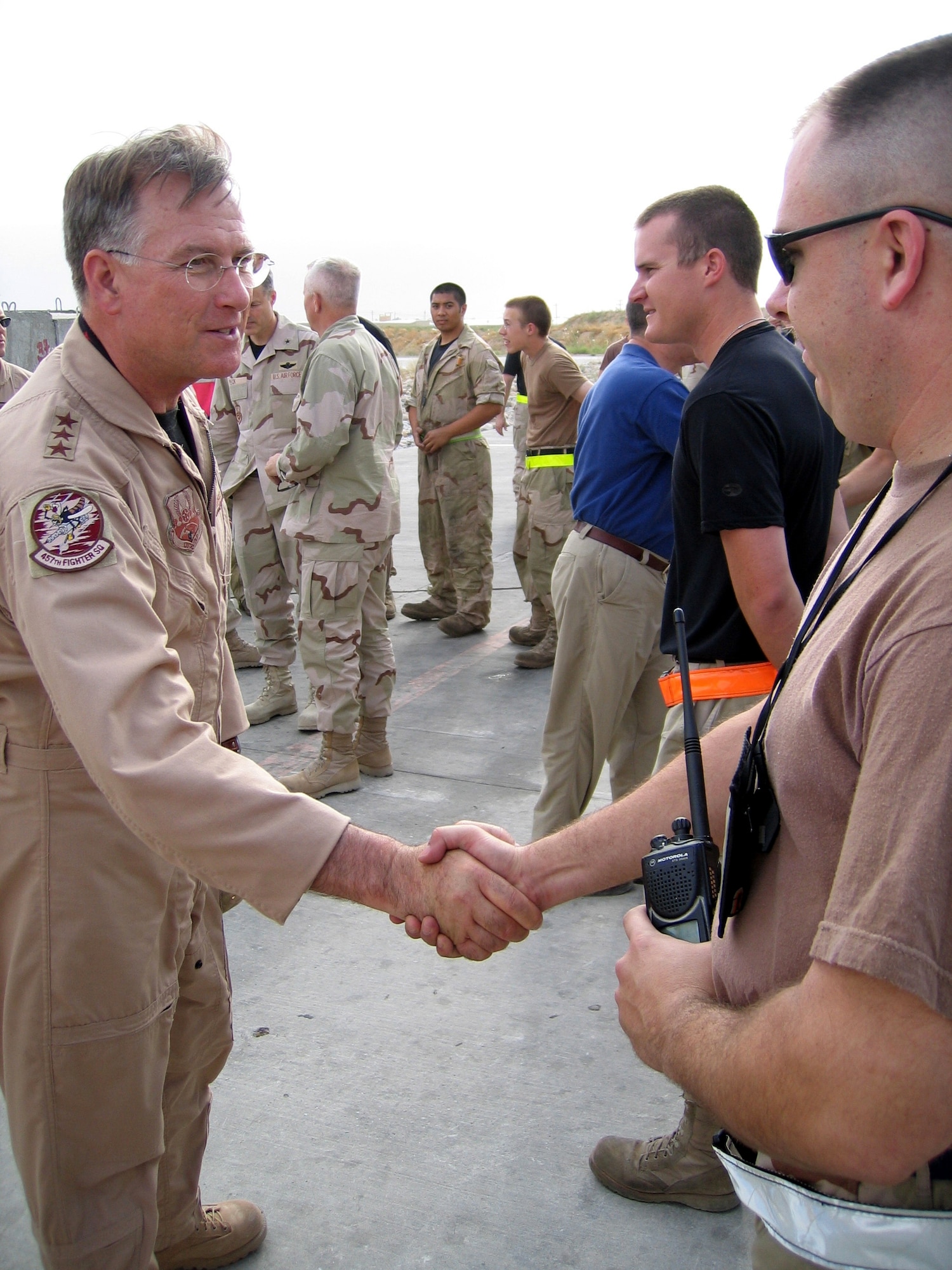 AFGHANISTAN -- Lt. Gen. John A. Bradley (left), commander of Air Force Reserve Command, met A-10 Thunderbolt II aircraft maintainers recently.  The general commanded the Air Force Reserve's 442nd Fighter Wing from July 1989 to January 1993 when the A-10 unit was at Richards-Gebaur Air Force Base, Mo.  (U.S. Air Force photo by Lt. Col. Anthony J. Seely)